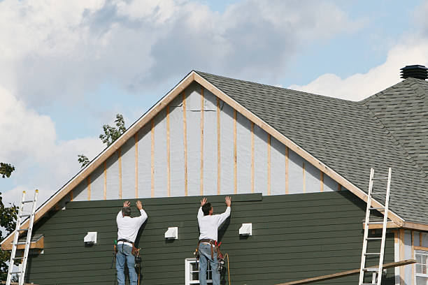 Professional Siding Replacement technician working in Dover, PA